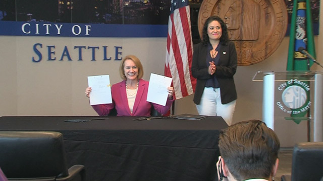 Mayor signs resolutions supporting access to legal abortions, American Dream and Promise Act 